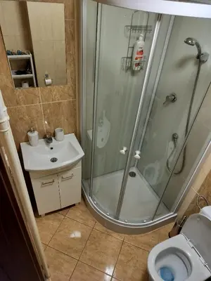 Łazienka w obiekcie Cosy Apartment Zwycięzców Saska Kępa