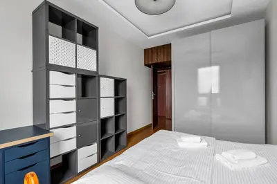 Łóżko lub łóżka w pokoju w obiekcie Homey Comfort Stay Apartment by BookingHost
