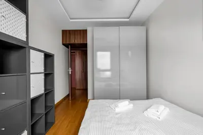 Łóżko lub łóżka w pokoju w obiekcie Homey Comfort Stay Apartment by BookingHost