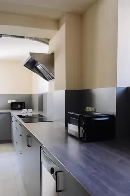 Kuchnia lub aneks kuchenny w obiekcie Boutique-Capsule Hostel