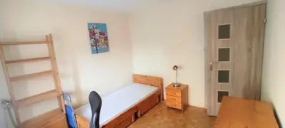 Łóżko lub łóżka w pokoju w obiekcie Like HOME
