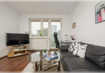 Telewizja i/lub zestaw kina domowego w obiekcie Beautiful City Apartment by Noclegi Renters