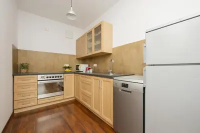 Kuchnia lub aneks kuchenny w obiekcie Beautiful City Apartment by Noclegi Renters