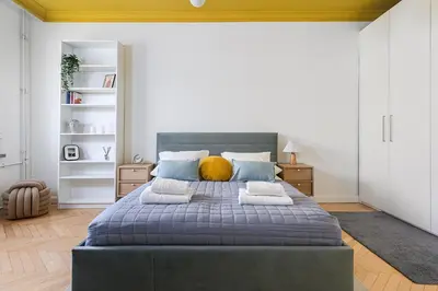Łóżko lub łóżka w pokoju w obiekcie P&O Apartments Marszalkowska - Plac Zbawiciela