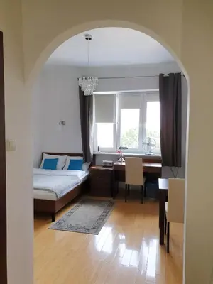 Łóżko lub łóżka w pokoju w obiekcie Studio Latte Juliana Bartoszewicza