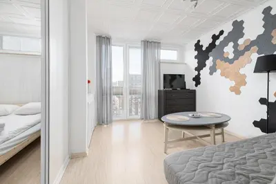 Łóżko lub łóżka w pokoju w obiekcie RentPlanet - Apartament przy Parku Mirowskim