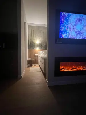 Telewizja i/lub zestaw kina domowego w obiekcie Deluxe Domaniewska Studio Apartment with AC by Renters Prestige