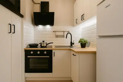 Kuchnia lub aneks kuchenny w obiekcie Cozy Apartment in City Center