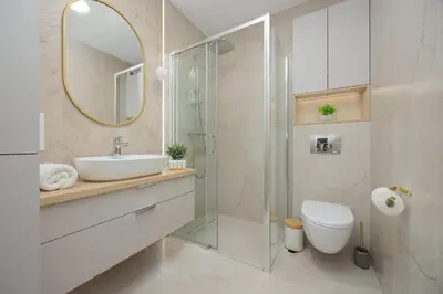 Łazienka w obiekcie Spacious Apartment with Parking on Grochów by Noclegi Renters