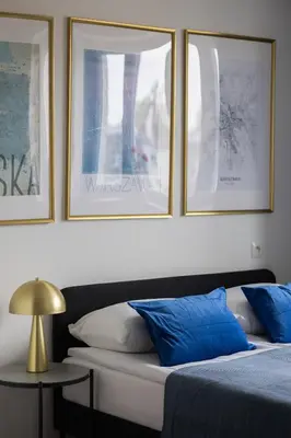 Łóżko lub łóżka w pokoju w obiekcie Warsaw Central Apartment by Noclegi Renters