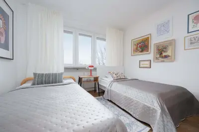 Łóżko lub łóżka w pokoju w obiekcie Warsaw Central Apartment by Noclegi Renters