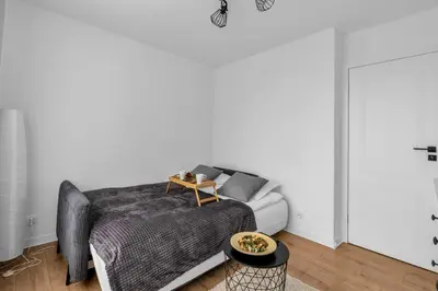 Łóżko lub łóżka w pokoju w obiekcie Saska Kępa Apt - 54m2, Two Bedrooms - by Rentujemy