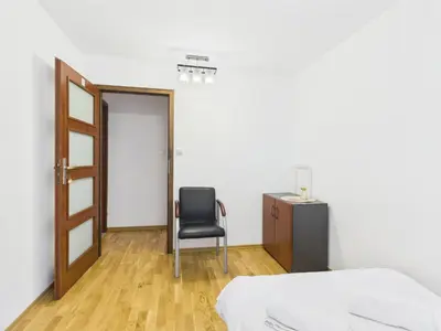 Łóżko lub łóżka w pokoju w obiekcie Platynowa 6 ROOMs SuperApart