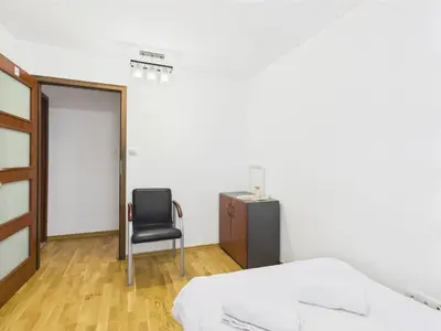 Łóżko lub łóżka w pokoju w obiekcie Platynowa 6 ROOMs SuperApart