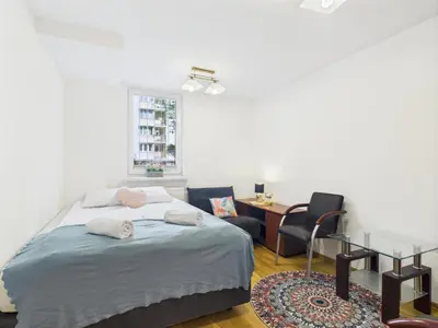 Łóżko lub łóżka w pokoju w obiekcie Platynowa 6 ROOMs SuperApart