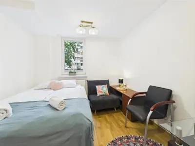 Łóżko lub łóżka w pokoju w obiekcie Platynowa 6 ROOMs SuperApart