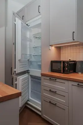Kuchnia lub aneks kuchenny w obiekcie Emilii Plater 36 - Better Rental