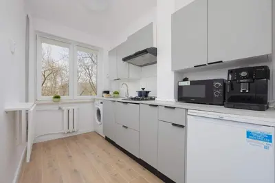 Kuchnia lub aneks kuchenny w obiekcie Bright Apartments Close to City Centre by Noclegi Renters