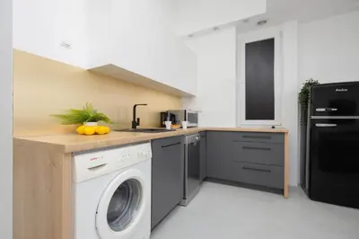 Kuchnia lub aneks kuchenny w obiekcie CityView Two-Storey Apartment Hala Mirowska Warsaw by Noclegi Renters