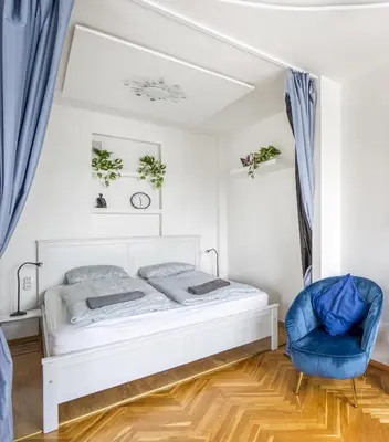 Łóżko lub łóżka w pokoju w obiekcie Labo Apartment Plac Teatralny