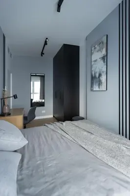 Łóżko lub łóżka w pokoju w obiekcie Warsaw Wola Premium Apartment by Evibell