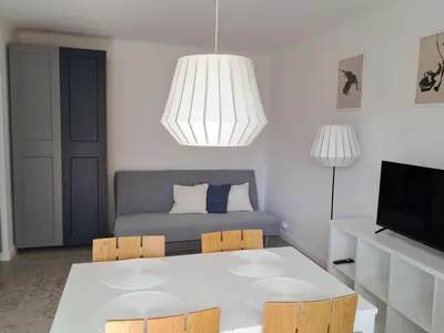 Łóżko lub łóżka w pokoju w obiekcie Bonifacy Apartment