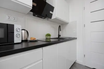 Kuchnia lub aneks kuchenny w obiekcie City Center Affordable & Cozy Studio Apartments by Noclegi Renters