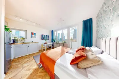 Łóżko lub łóżka w pokoju w obiekcie Greenline Studio Best Location City Center