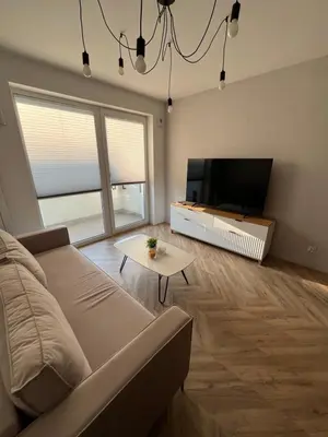 Telewizja i/lub zestaw kina domowego w obiekcie Sky Line Boarding Stay 6 Persons 24 7 Check In