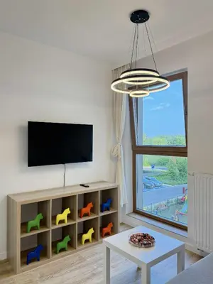 Telewizja i/lub zestaw kina domowego w obiekcie Mei Apartment near Chopin Airport Warsaw