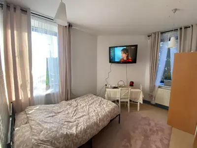 Łóżko lub łóżka w pokoju w obiekcie Arkuszowa 58 Apartament 5