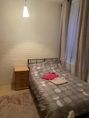 Łóżko lub łóżka w pokoju w obiekcie Arkuszowa 58 Apartament 5