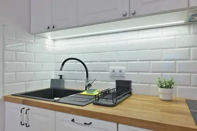Kuchnia lub aneks kuchenny w obiekcie D&A Apartament Powiśle Solec PGE Narodowy