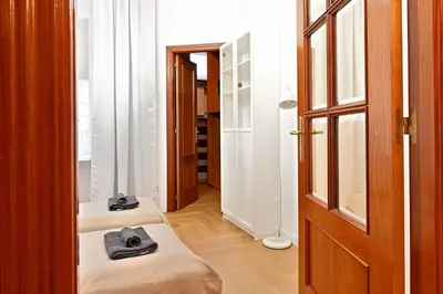 Łóżko lub łóżka w pokoju w obiekcie D&A Apartament Powiśle Solec PGE Narodowy