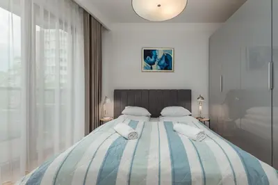 Łóżko lub łóżka w pokoju w obiekcie Domaniewska 34B by Homeprime