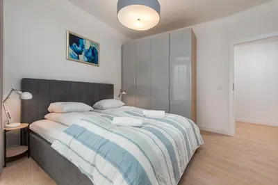 Łóżko lub łóżka w pokoju w obiekcie Domaniewska 34B by Homeprime