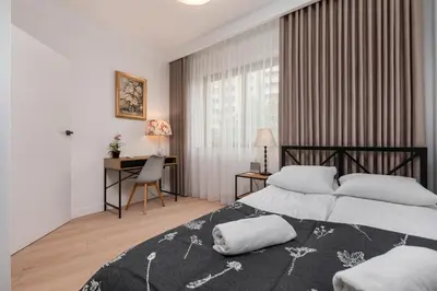Łóżko lub łóżka w pokoju w obiekcie Domaniewska 34B by Homeprime