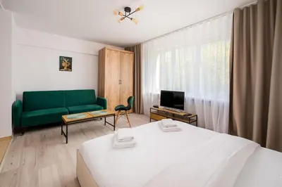 Telewizja i/lub zestaw kina domowego w obiekcie Warsaw Downtown Serenity Studio by BookingHost
