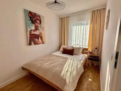 Łóżko lub łóżka w pokoju w obiekcie Millennium Talarowa Mango