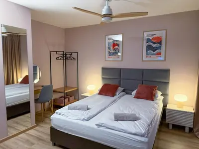 Łóżko lub łóżka w pokoju w obiekcie Pink Studio with balcony - self check-in