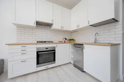 Kuchnia lub aneks kuchenny w obiekcie Chrzanowskiego 7 Bright Pet Friendly Apartment by Noclegi Renters
