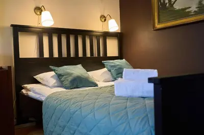 Łóżko lub łóżka w pokoju w obiekcie Old Town Vibe Premium Apartment Studio
