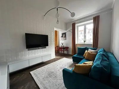 Telewizja i/lub zestaw kina domowego w obiekcie Copernicus Old Town Apartment