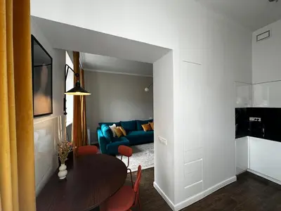 Telewizja i/lub zestaw kina domowego w obiekcie Copernicus Old Town Apartment