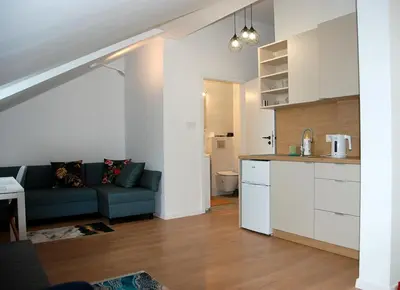 Kuchnia lub aneks kuchenny w obiekcie Cozy Apartment Penthouse Praga Kamionek