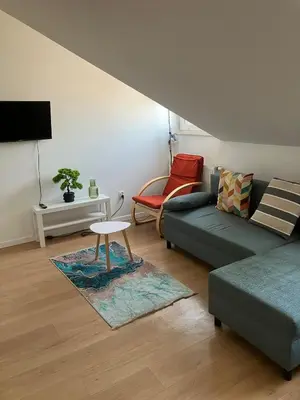 Część wypoczynkowa w obiekcie Cozy Apartment Penthouse Praga Kamionek