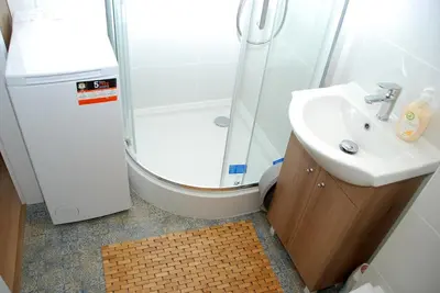 Łazienka w obiekcie Cozy Apartment Penthouse Praga Kamionek