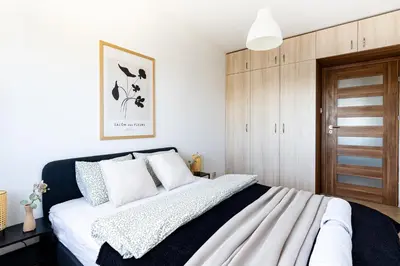 Łóżko lub łóżka w pokoju w obiekcie Grójecka 14a SuperApart z balkonem na Ochocie