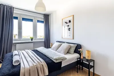 Łóżko lub łóżka w pokoju w obiekcie Grójecka 14a SuperApart z balkonem na Ochocie
