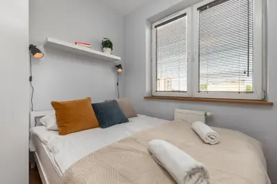 Łóżko lub łóżka w pokoju w obiekcie Tarchomińska 15 by Homeprime